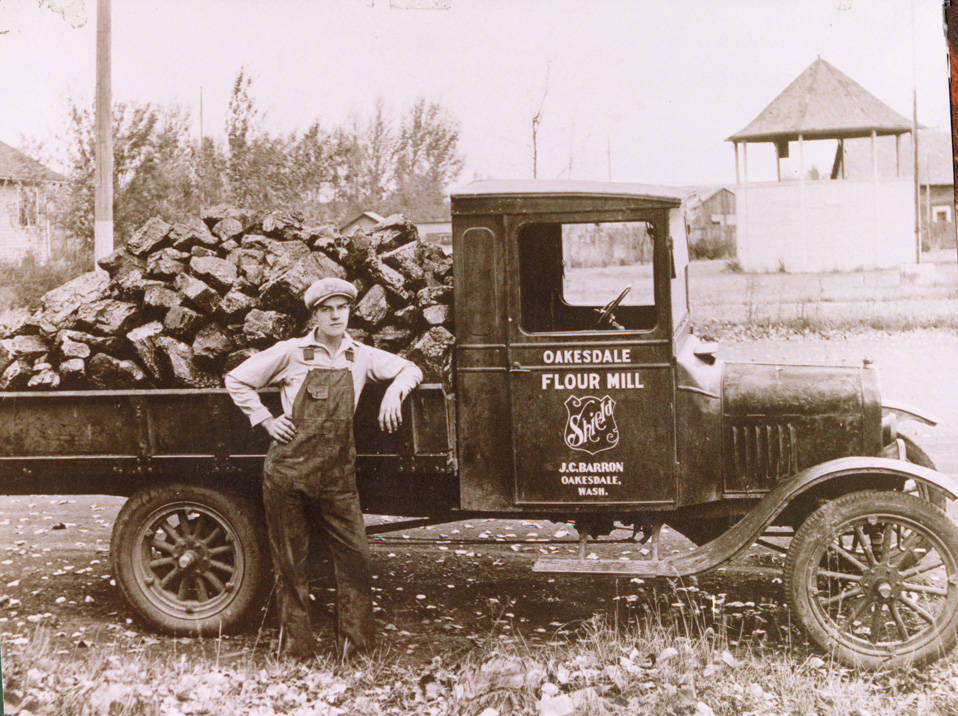 Innovia Foundation - Oakesdale Mill Historic photo - man with mill truck