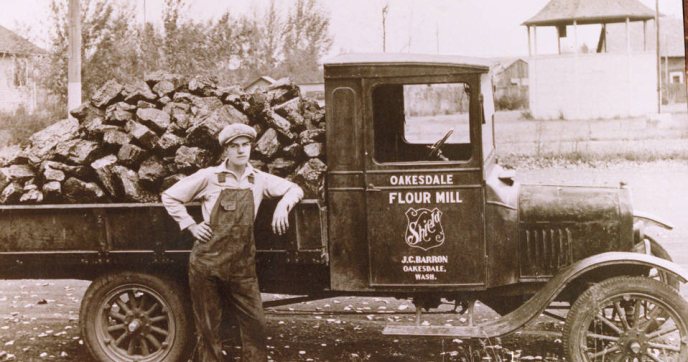 Innovia Foundation - Oakesdale Mill Historic photo - man with mill truck