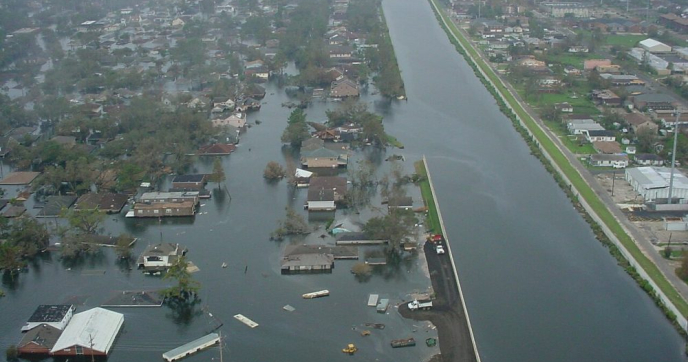 The 17th Street Canal breach caused by Hurricane Katrina in 2005. The Greater New Orleans Foundation spearheaded a network of funders to equitably respond to frequent extreme weather events. Credit: U.S. Army/SEWilco, public domain